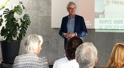 Harm Drost bij bespreking evaluatie huisvestingsconcept