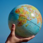 globe in hand